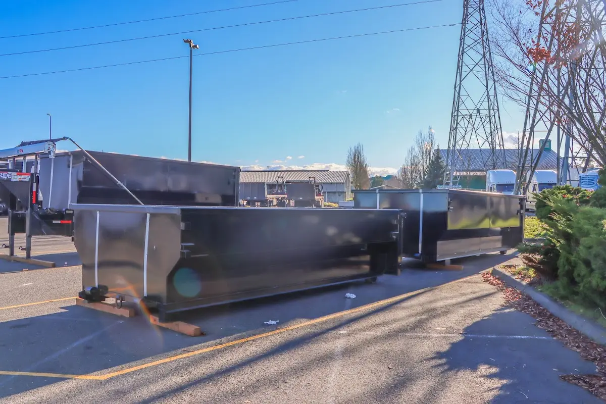 Roll-off dumpster ready for waste disposal at job site for Estate Cleanout Dumpster Rental in Wilmington Island